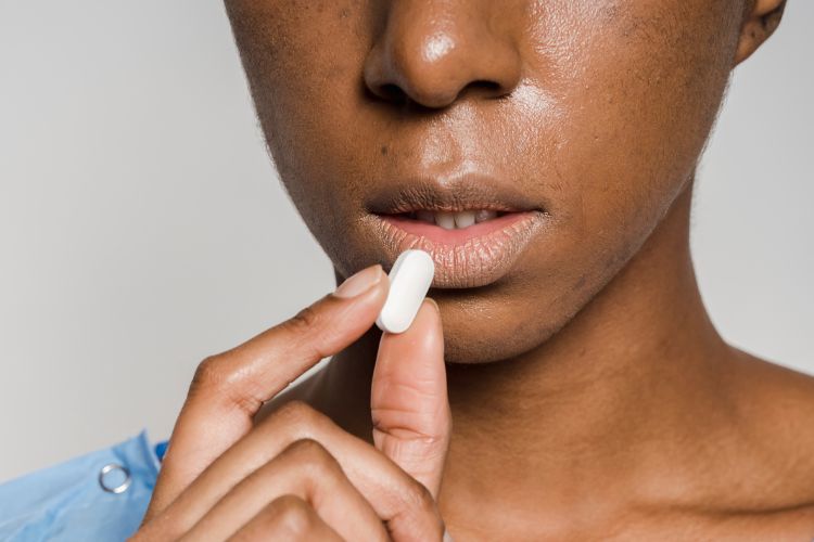 woman taking abortion pills in Harlem