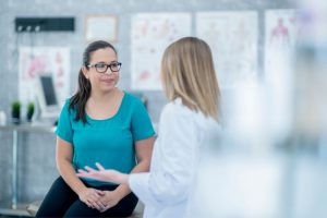 Washington Heights abortion doctor talks to patient about pain management