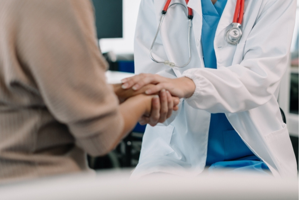 doctor comforting woman before an emergency abortion in New Jersey