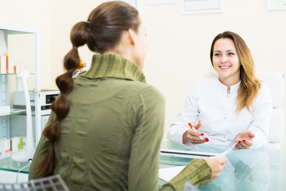 doctor reviewing New Jersey abortion prep list with patient