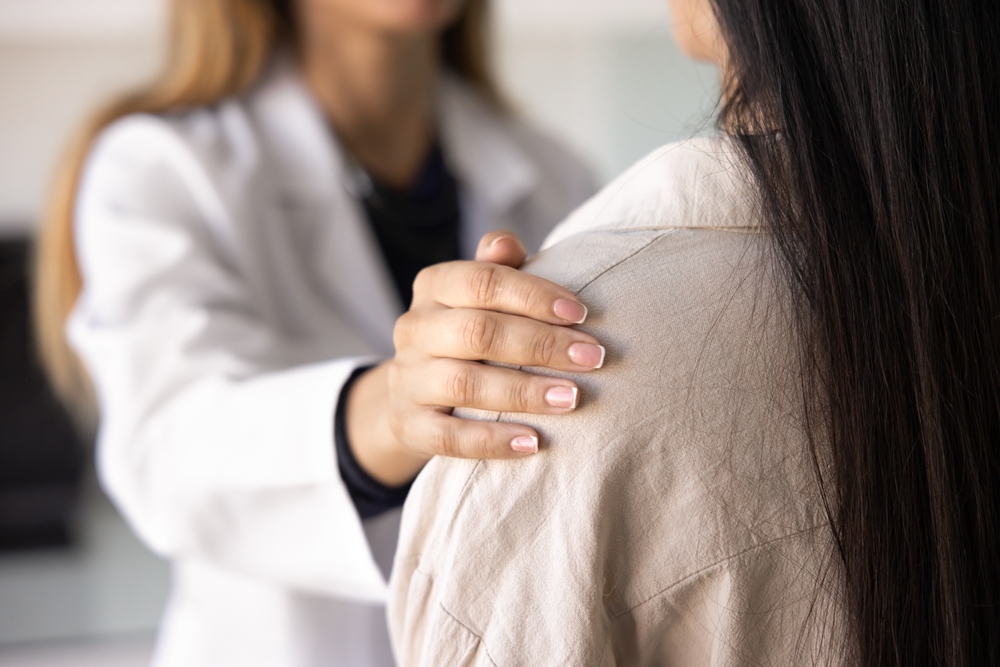 doctor comforing mom of child with fetal anomalies in New Jersey