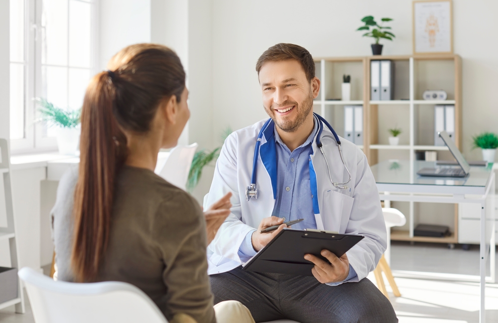 woman discussing an early surgical abortion in New Jersey with doctor
