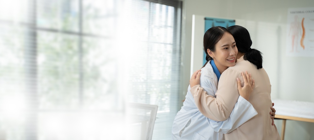 doc hugging patient after manual vacuum aspiration in Bergen County