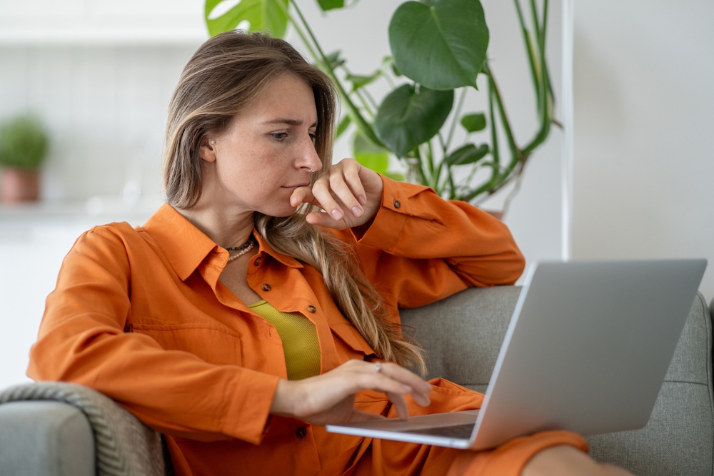 woman reading abortion information online