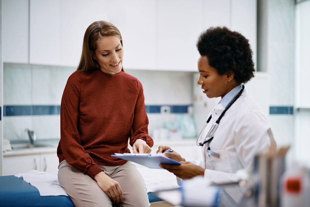 woman asking questions before scheduling a second-trimester abortion in NJ