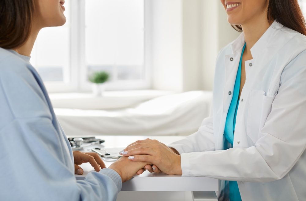 woman thanking doctor after having abortion complications in NJ